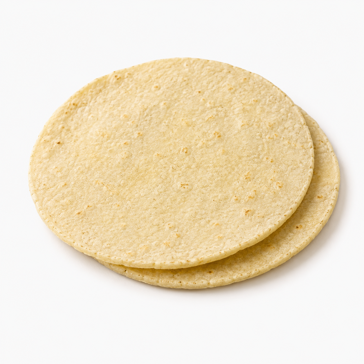 Dos tortillas de maíz apiladas.